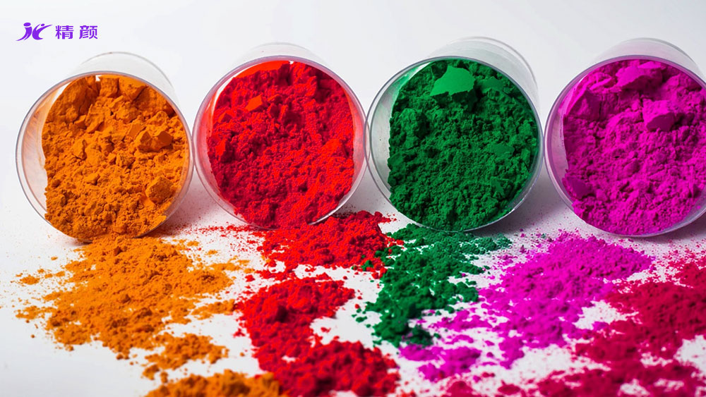 红色、紫色、黄色、绿色染料色粉实拍图